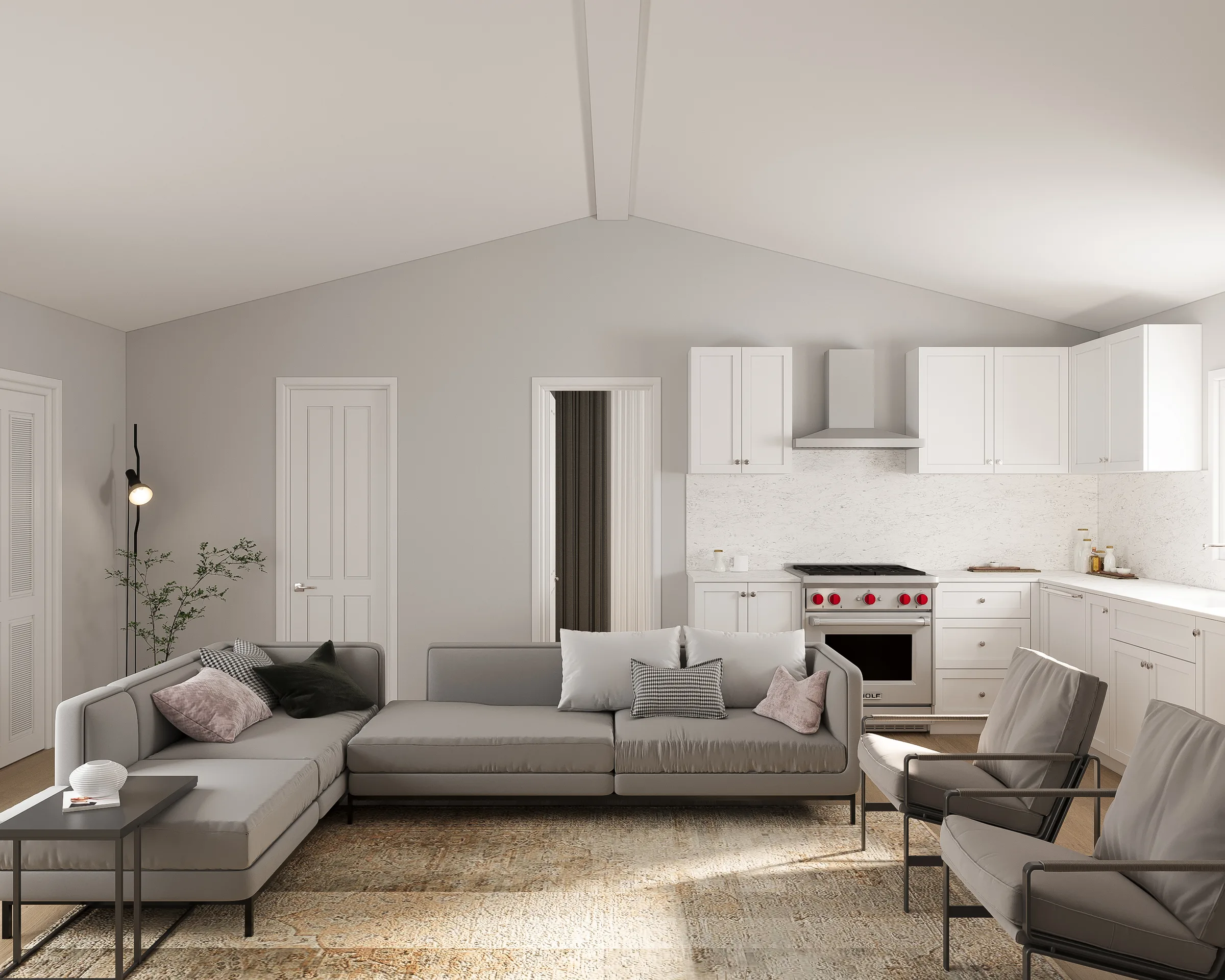 Bellecielo living — vaulted great room opening to kitchen