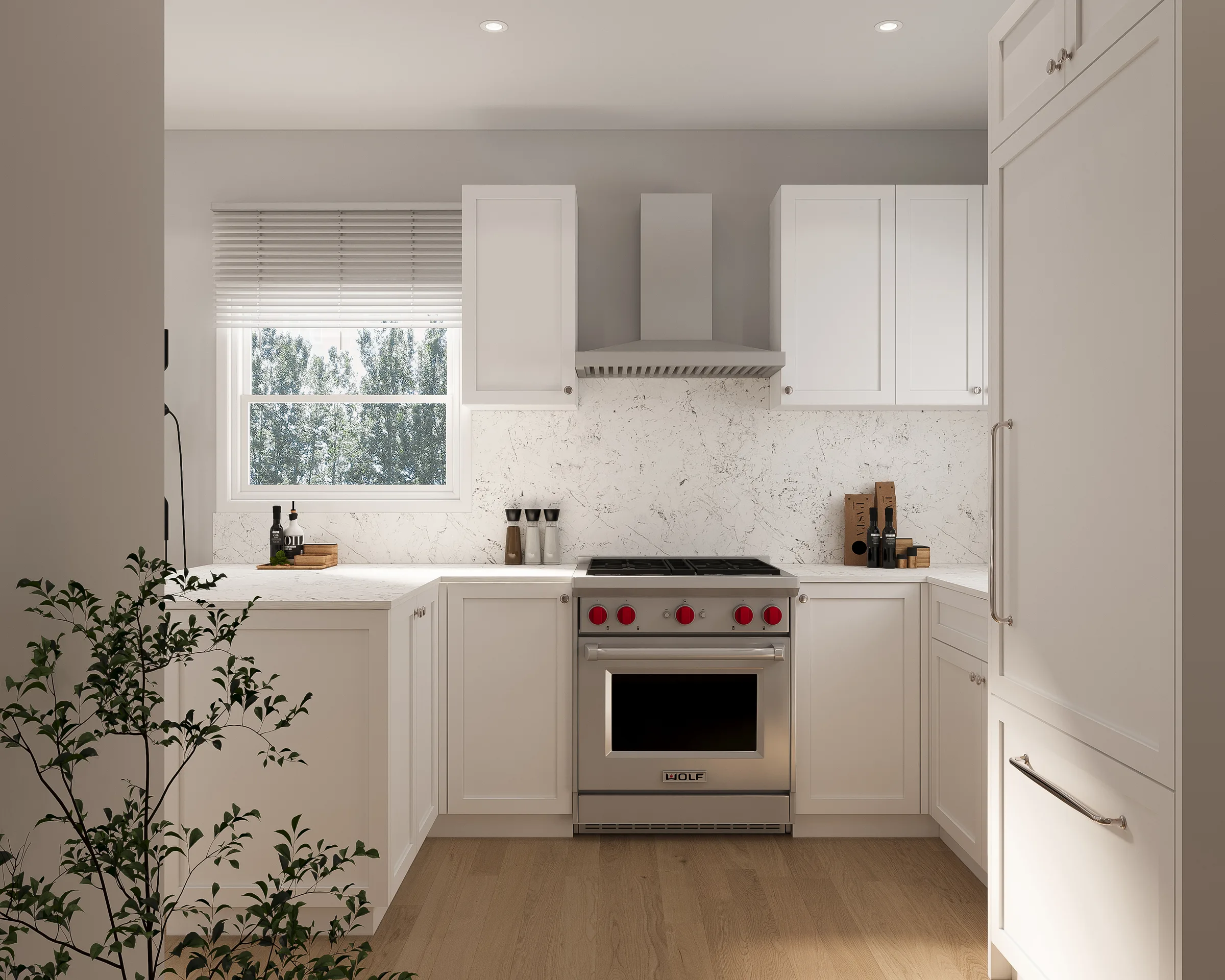 Casielo kitchen — U-shape with Wolf range and marble backsplash