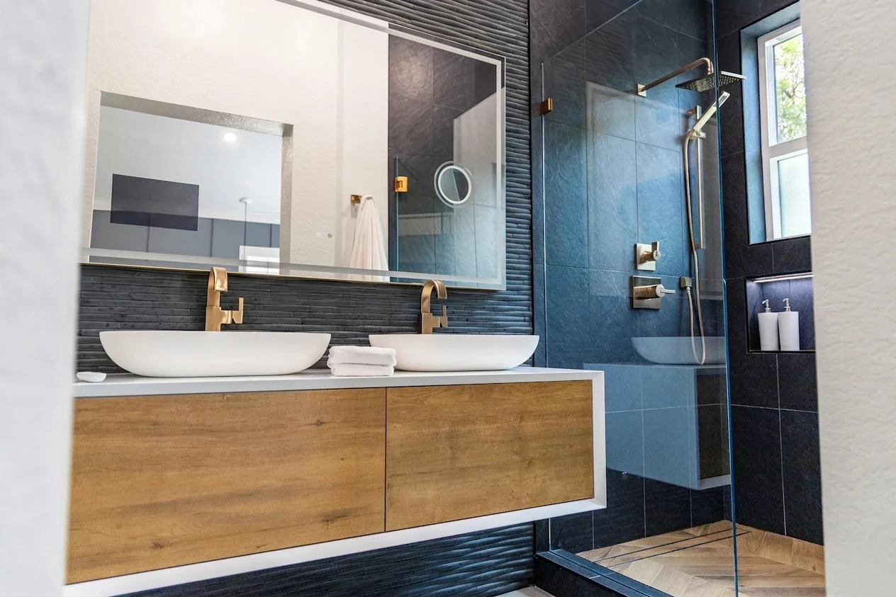 Whole-home remodel — floating oak vanity, twin vessel basins and walk-in shower, Orange, Avorino