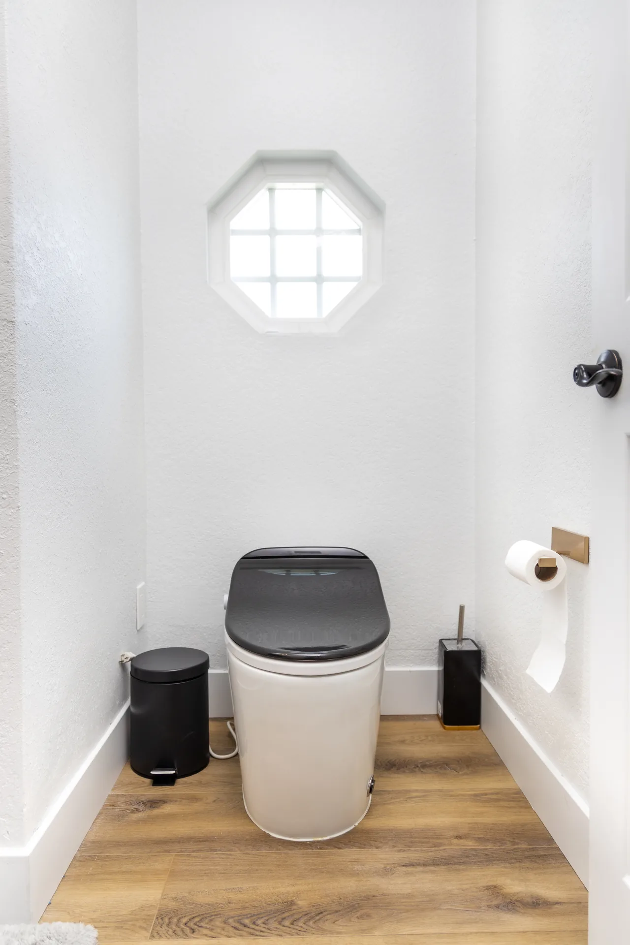 Whole-home remodel — powder room with octagon window, Orange, Avorino