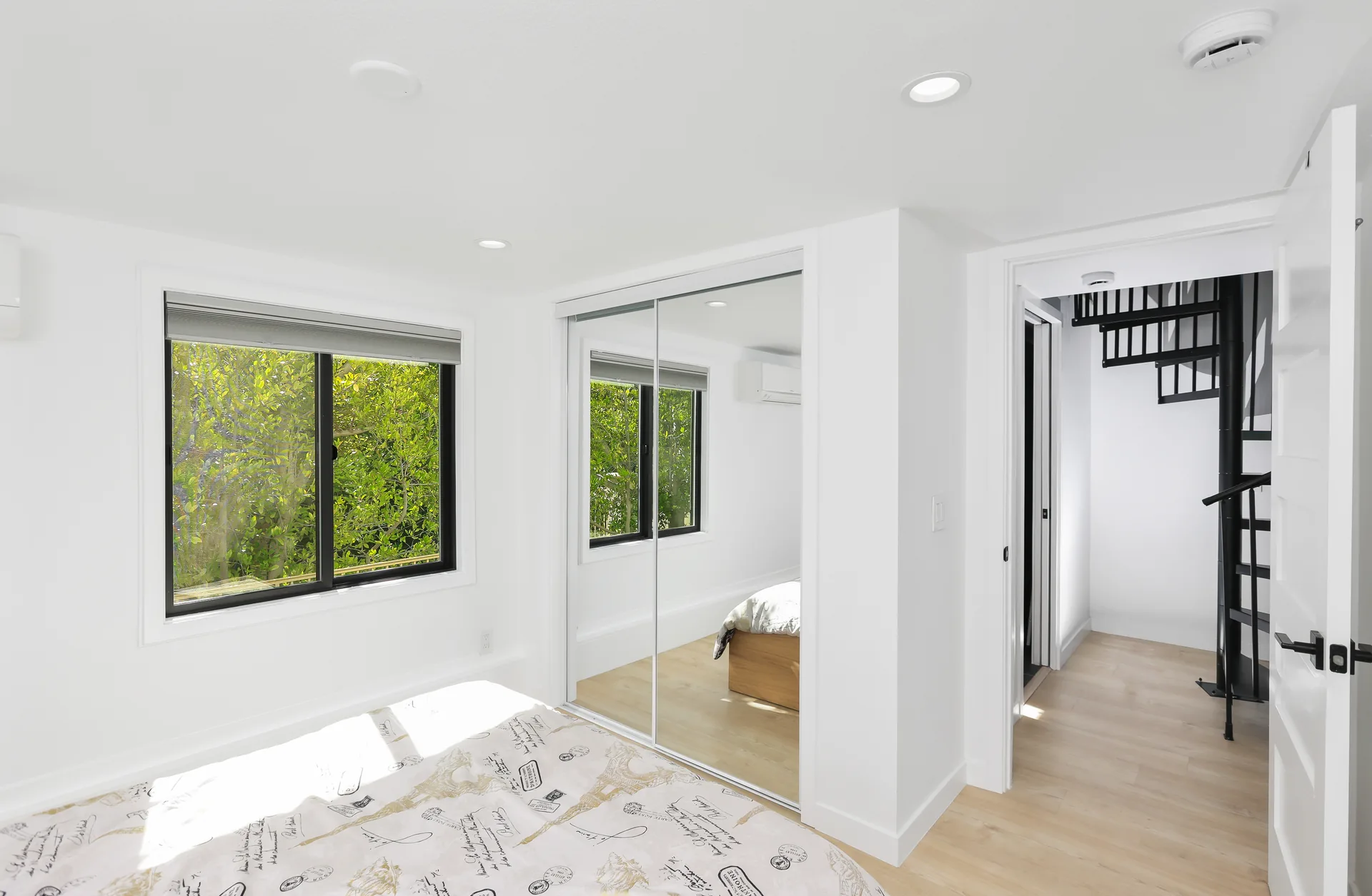 Two-story detached ADU — bedroom to the spiral stair, Santa Ana Hills, Avorino