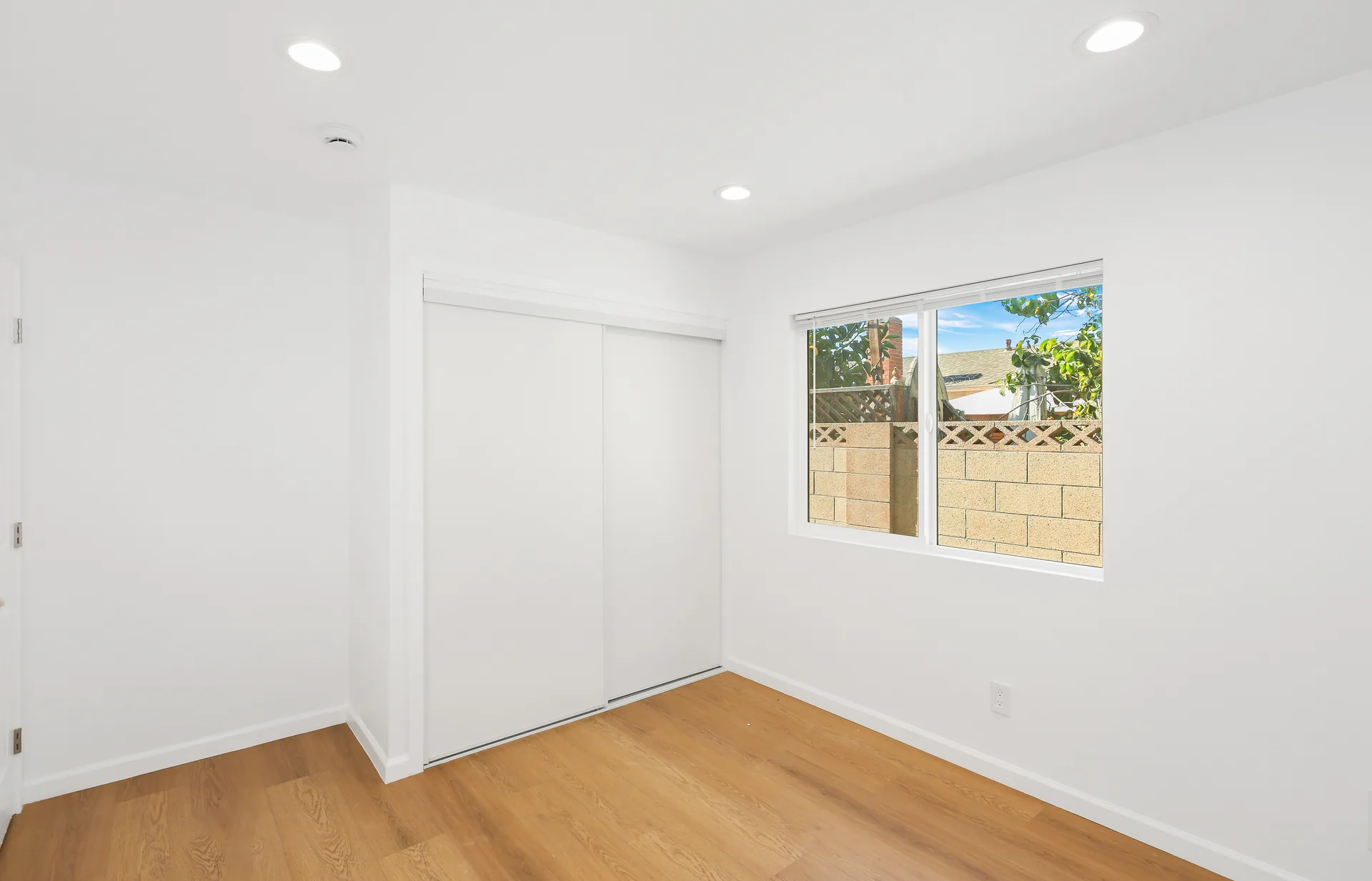Detached ADU — bedroom with closet and window, Buena Park, Avorino