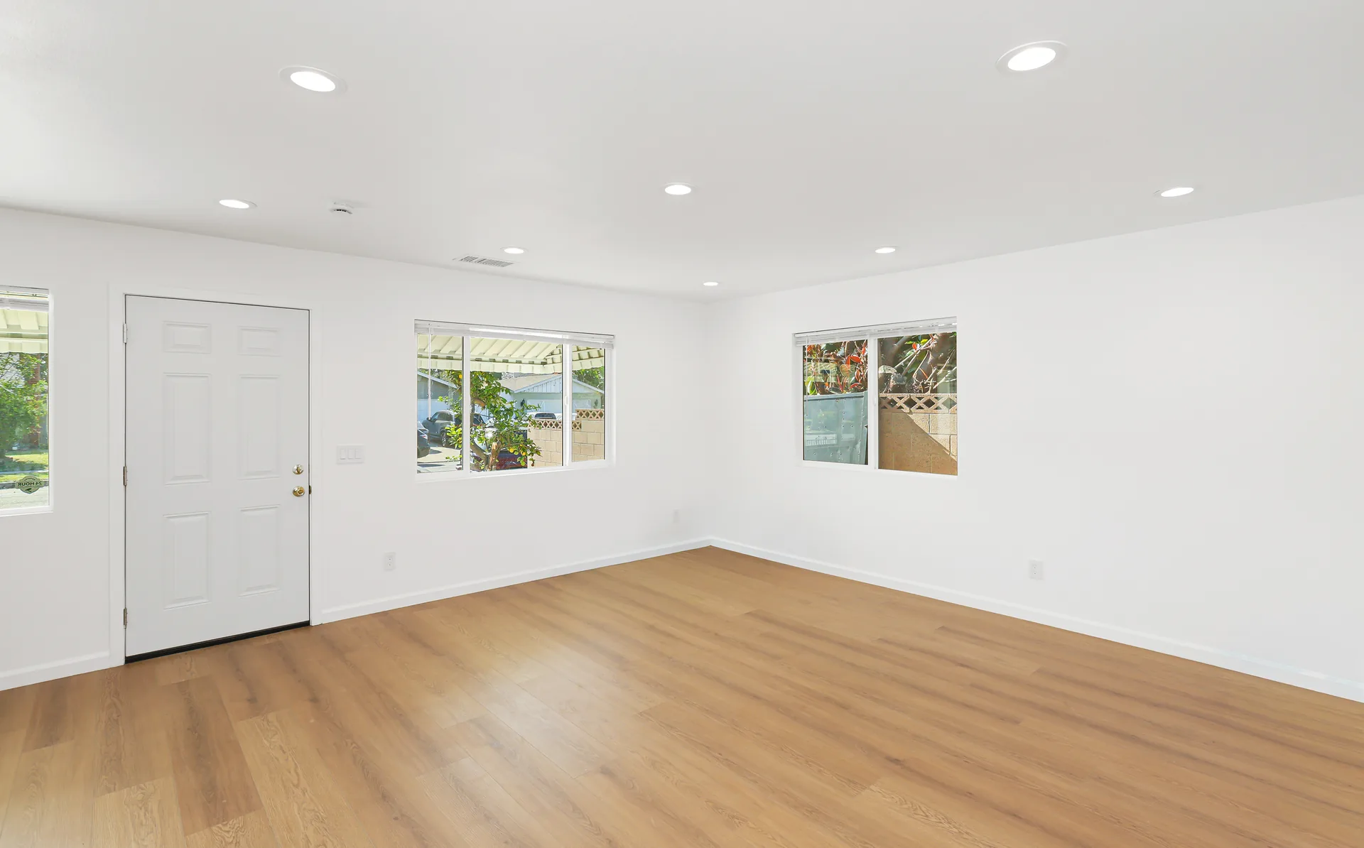 Detached ADU — living room, entry door and front windows, Buena Park, Avorino