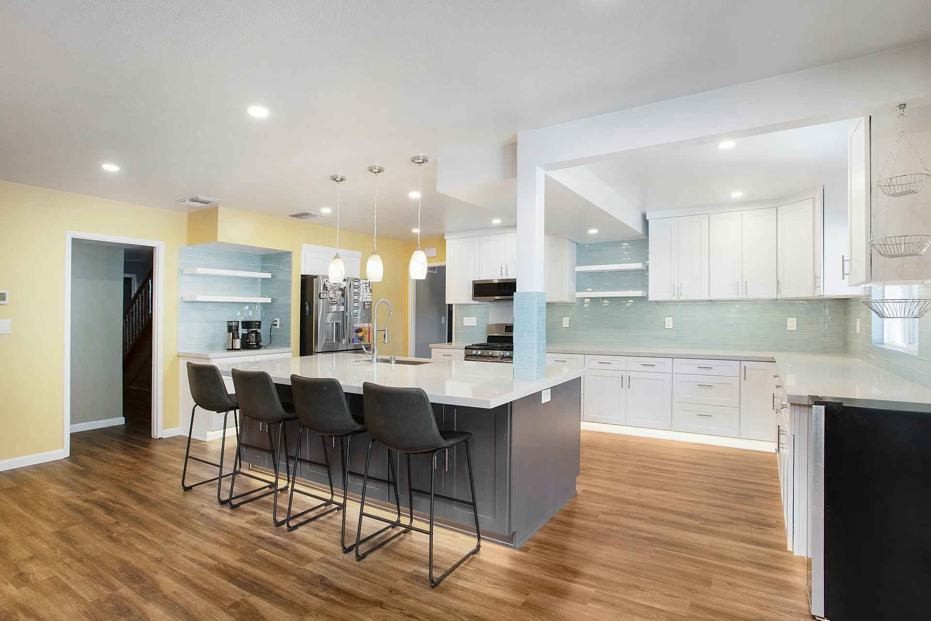 Open-concept kitchen remodel — island with seating, Orange, Avorino