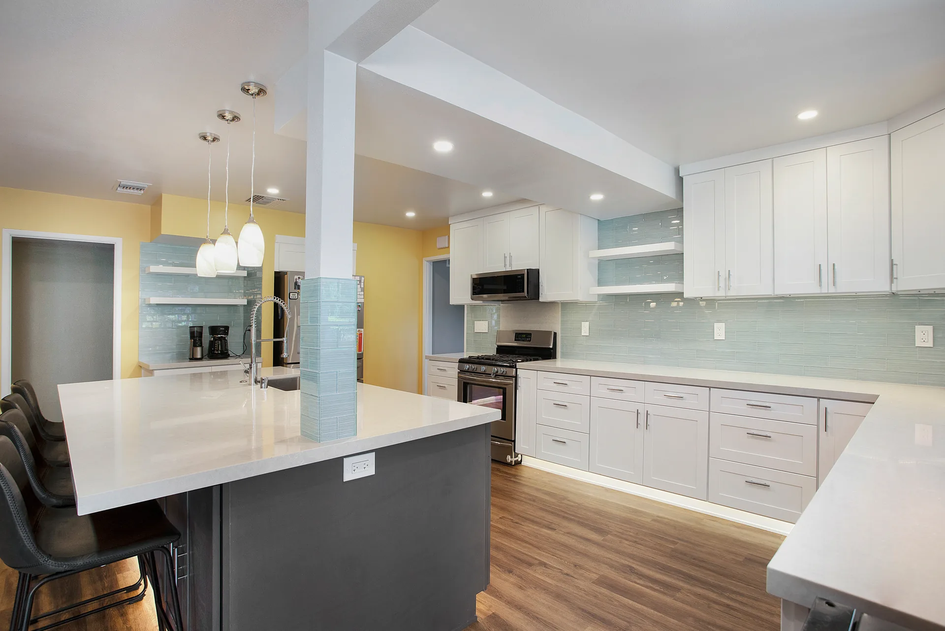 Open-concept kitchen remodel — island and open floor plan, Orange, Avorino