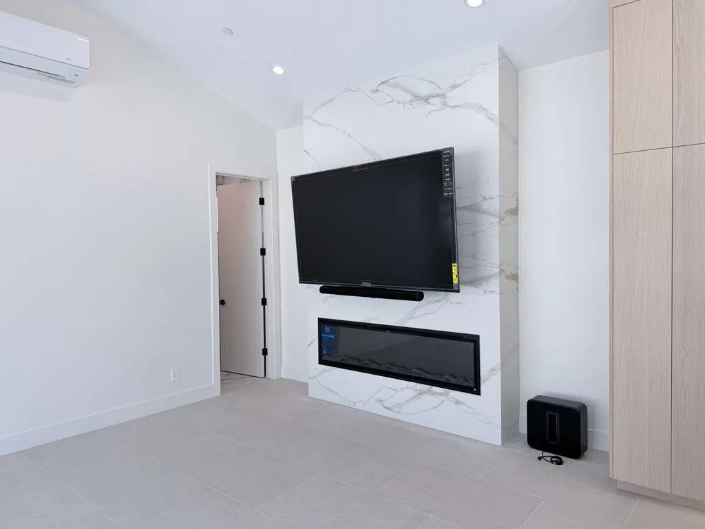 Custom pool house — media wall with linear fireplace, San Juan Capistrano, Avorino