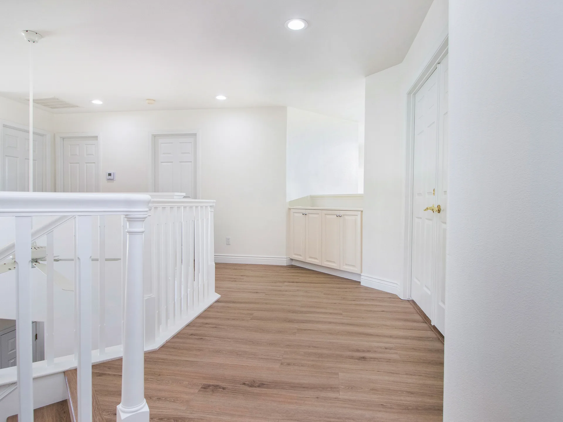 Hillside custom home — upper landing and hall, Laguna Niguel, Avorino