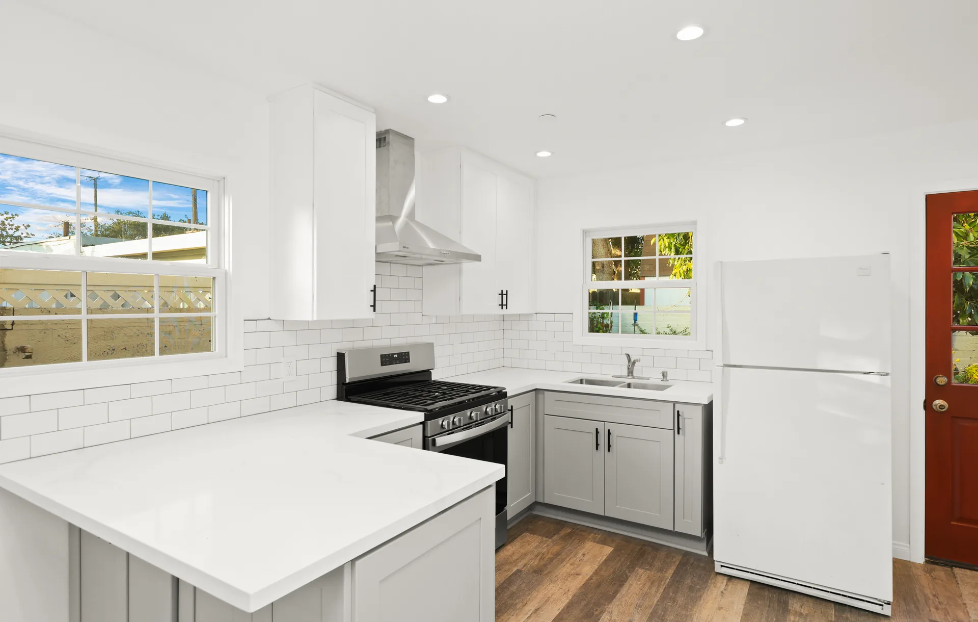 Attached ADU — kitchen with subway-tile backsplash and gray lowers, Orange, Avorino