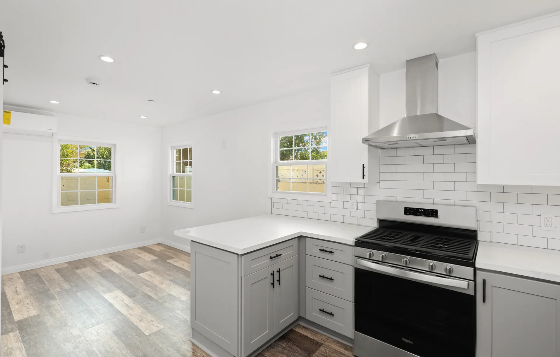 Attached ADU — kitchen run under the range hood, Orange, Avorino