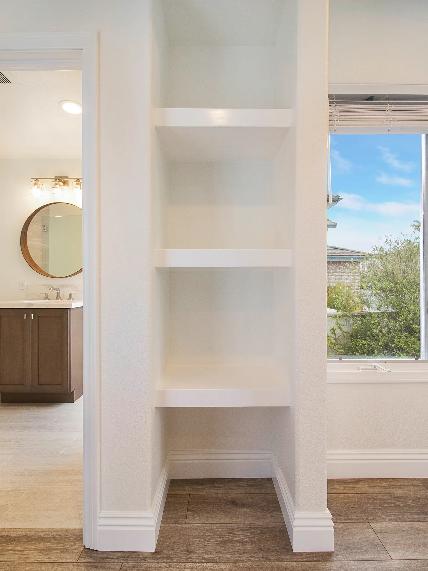 Whole-home remodel — built-in shelving and bath beyond, Laguna Niguel, Avorino